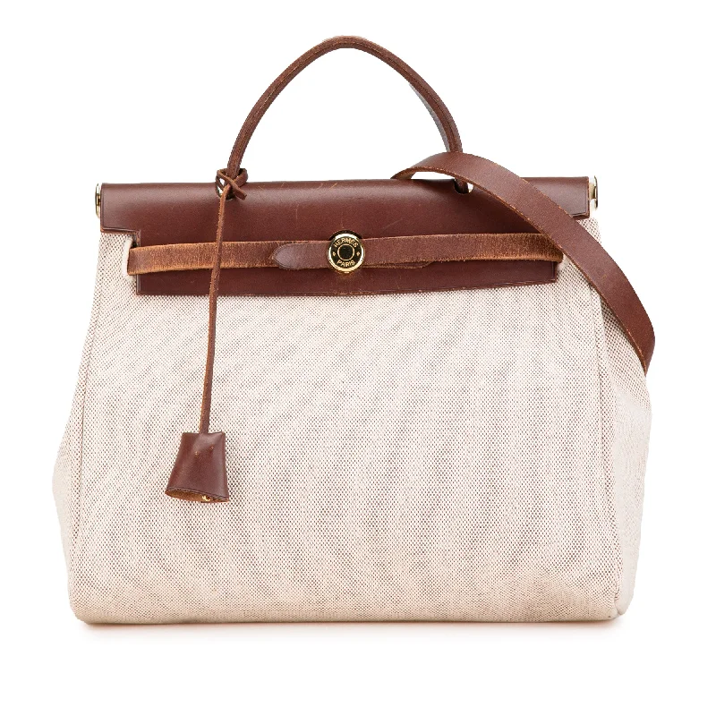 Hermes Bags with Magnetic and Twist - Lock ClosuresBeige Hermès Toile Herbag Zip 31 Satchel