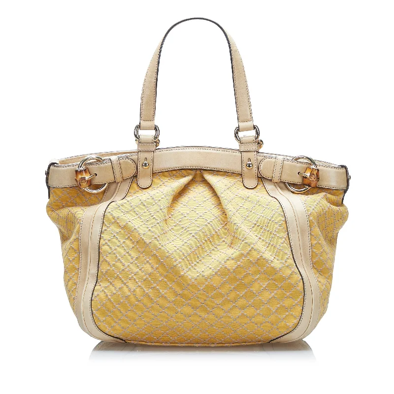 Women Gucci Sylvie bags with a detachable ribbon detailGucci Diamante Bamboo Handbag