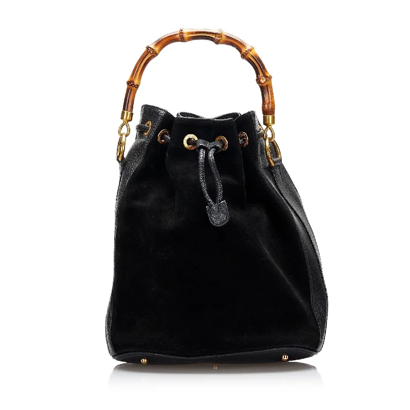 Women Gucci Sylvie bags with a leather - wrapped handleGucci Suede Bamboo Bucket Satchel