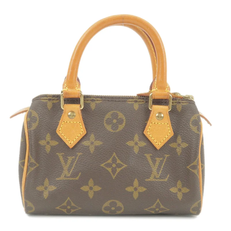 Ladies Louis Vuitton shoulder bags with a tassel decoration for charmLouis Vuitton Monogram Mini Speedy Hand Bag Purse M41534