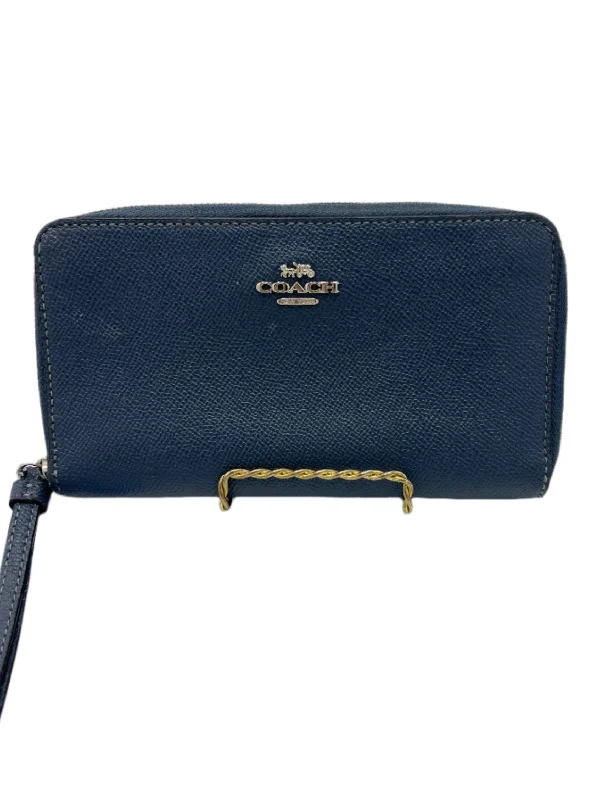 Coach Borough bags with a removable interior organizerWristlet Designer By Coach