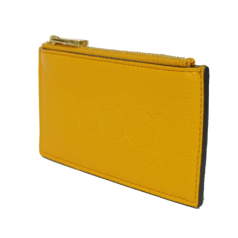 Gucci Marmont bags for women with quilted leather exteriorsGUCCI Coin case 725550 AABEY 7636 Textured leather yellow Logo embossing Fragment case mens Used