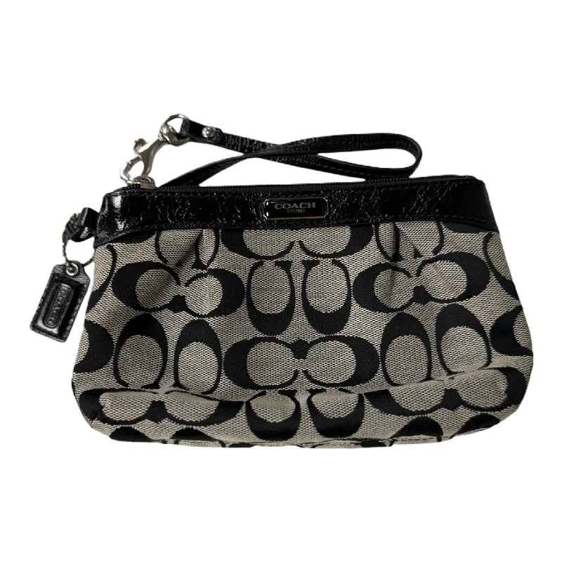 Coach backpacks with a padded laptop sleeve for travel and workWristlet Designer By Coach, Size: Small