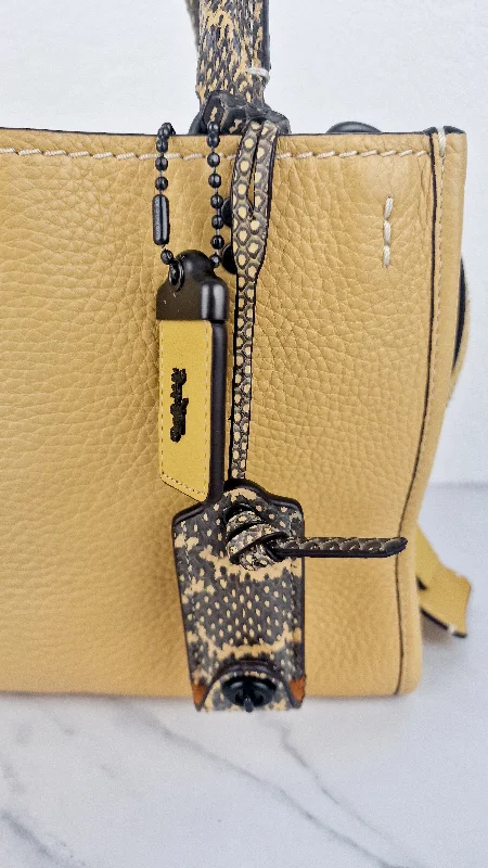 Ladies Coach Tabby bags with a detachable shoulder strapCoach 1941 Rogue 25 in Hay Yellow with Snakeskin Handles - Shoulder Bag Handbag in Pebble Leather Colorblock - Coach 59235