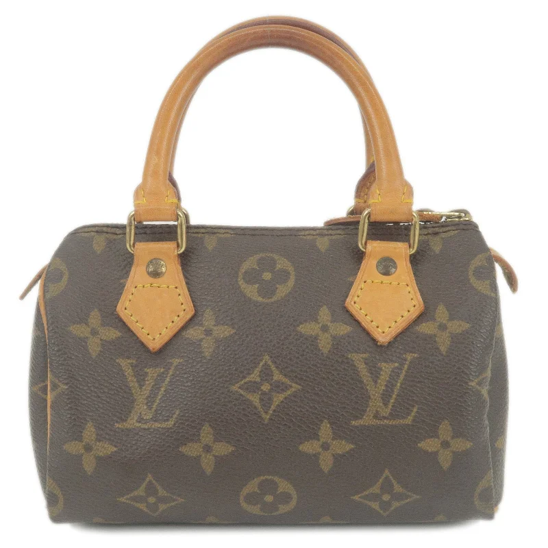 Ladies Louis Vuitton Petite Malle bags with a star - shaped charm for cutenessLouis Vuitton Monogram Mini Speedy Hand Bag Boston Bag M41534