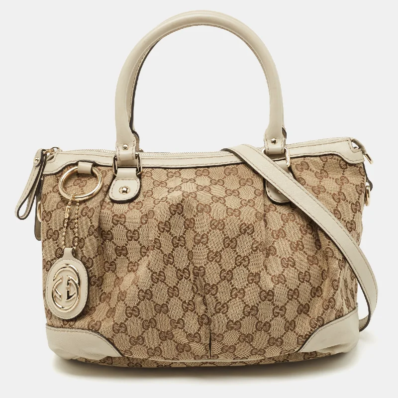 Women Gucci backpacks with a luxurious leather finishGucci Beige/Cream GG Canvas and Leather Medium Sukey Tote