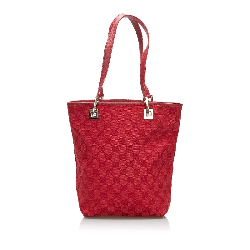 Women Gucci bags with interlocking G hardware for a classic lookGucci GG Canvas Tote Tote Bag