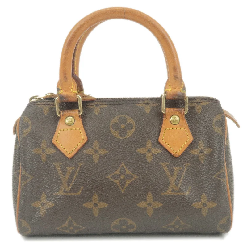 Louis Vuitton bags with a snap - button closure and a decorative charm for styleLouis Vuitton Monogram Mini Speedy Hand Bag Boston Bag M41534