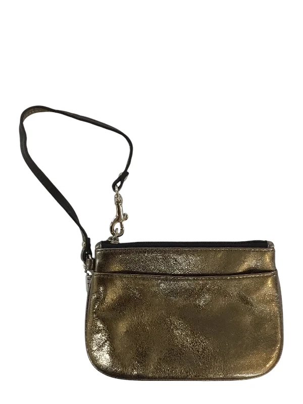 Coach Dempsey bags with a contrast - colored interior for visual interestWristlet Designer By Coach, Size: Medium