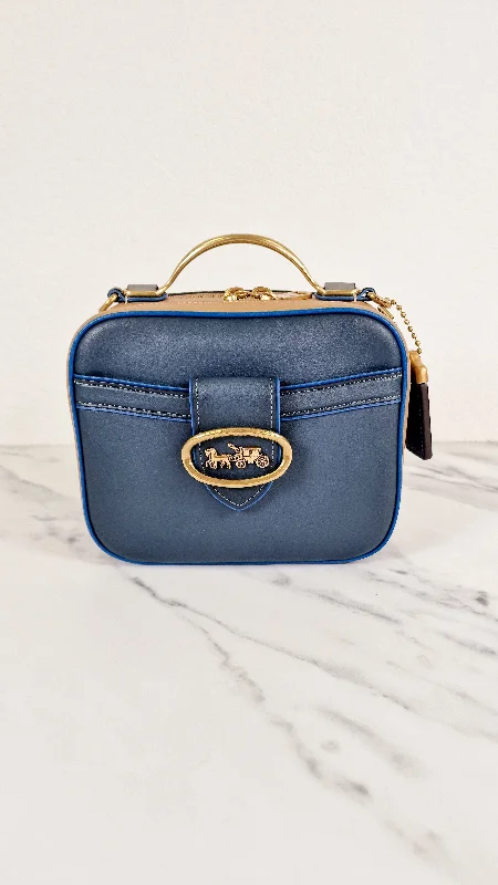 Coach Borough bags with a contrast - stitched handle for a unique lookCoach 1941 Riley Lunchbox Bag in Dark Denim Blue Smooth Leather Colorblock Tophandle Crossbody Bag - Coach 704