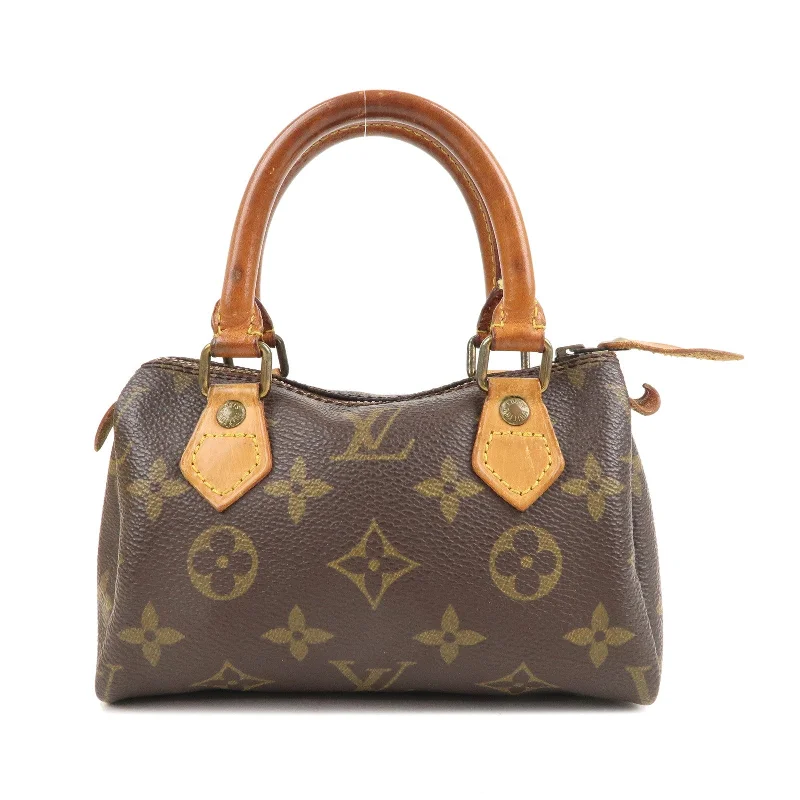 Louis Vuitton Speedy bags in monogram canvas for a classic lookLouis Vuitton Monogram Mini Speedy Hand Bag Boston Bag M41534