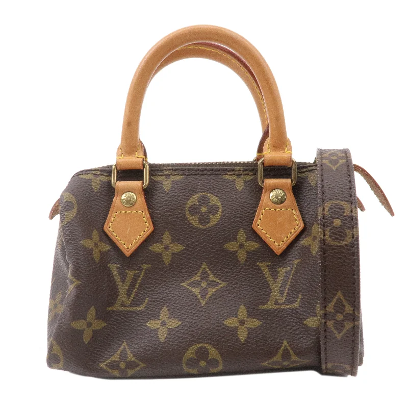 Louis Vuitton Twist bags with a crystal - embellished LV - turnlockLouis Vuitton Monogram Mini Speedy & Strap M41534 J75010