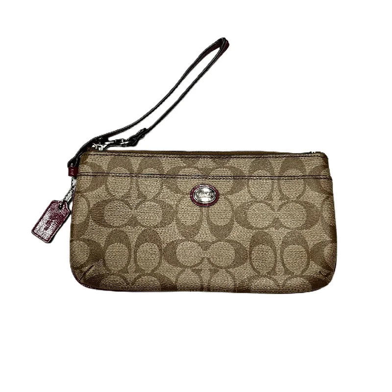 Coach crossbody bags with a detachable coin purse for added functionalityWristlet Designer By Coach, Size: Medium