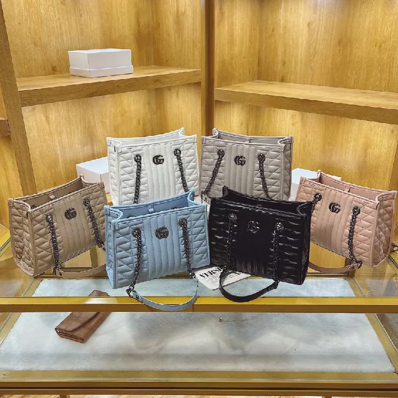 Women Gucci bags with a chain - link trim and a leather bodyGucci Handbags