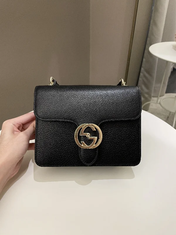 Ladies Gucci handbags with a detachable coin purse insideGucci Interlocking GG Bag Black Grained Leather