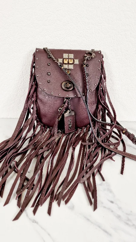 Coach backpacks with a hidden back pocket for securityCoach 1941 Fringe Saddle Bag with Pyramid Rivets in Oxblood Smooth Leather & Ram Charm - Coach 48617