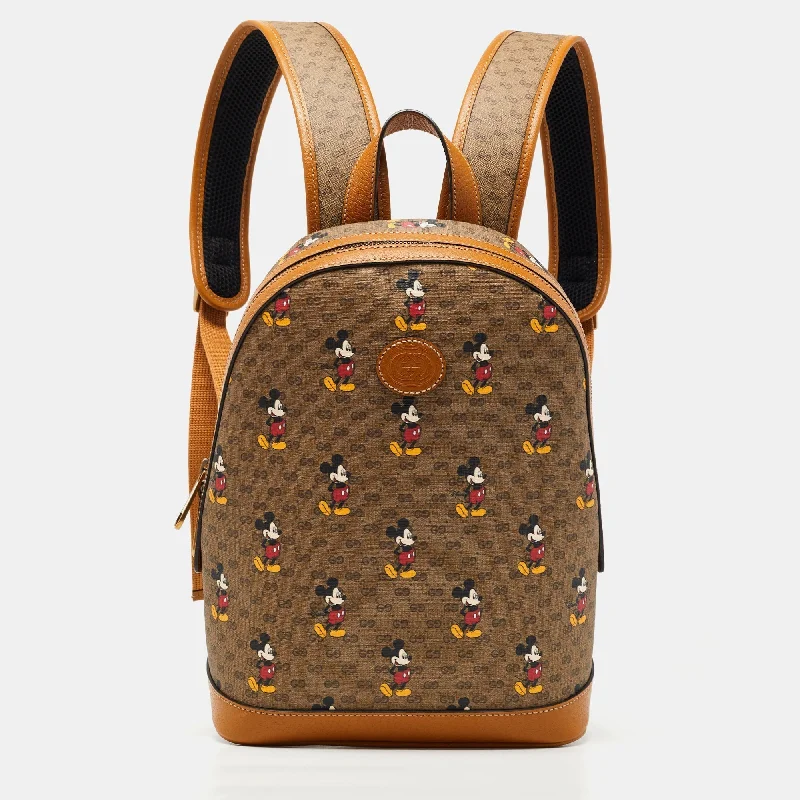 Women Gucci Sylvie bags with a detachable ribbon detailGucci x Disney Tan/Beige Mickey Print GG Supreme Canvas Small Backpack