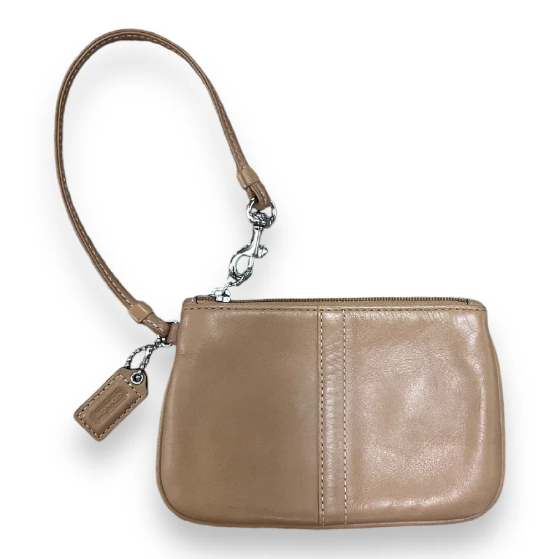 Ladies Coach Borough bags in a pastel shade for a soft and delicate appearanceWristlet Designer By Coach, Size: Small