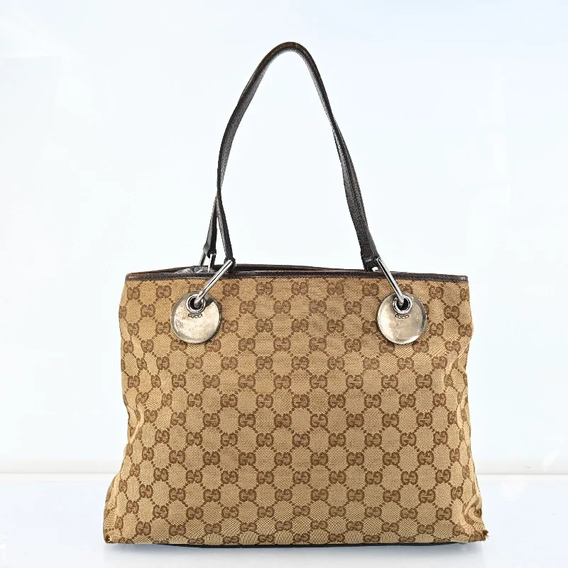 Women Gucci Sylvie bags with a crystal - embellished web stripeGucci Eclipse Shoulder Hand Bag Gg