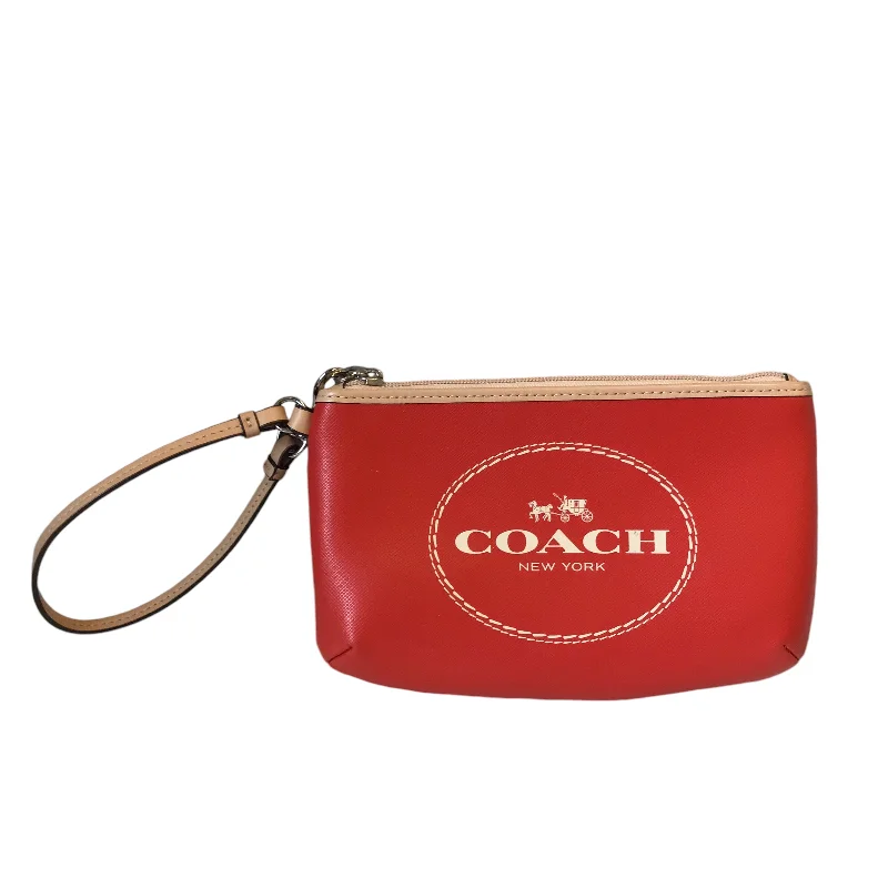 Coach Borough bags with a structured silhouette and a magnetic - snap closureWristlet Designer By Coach In Orange, Size:Small