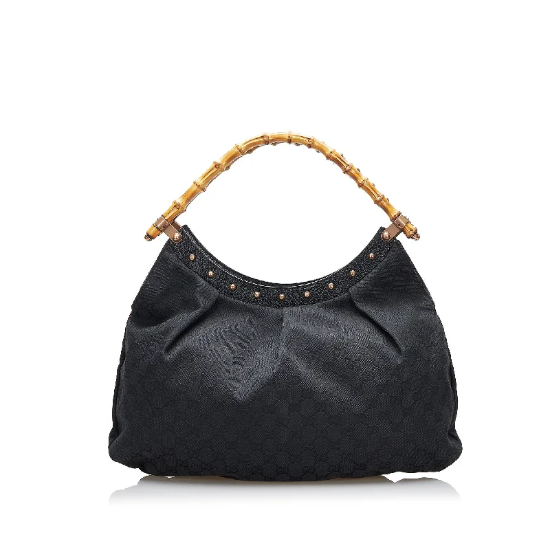 Ladies Gucci Dionysus bags with a star - shaped charmGucci Bamboo GG Canvas Hobo Bag