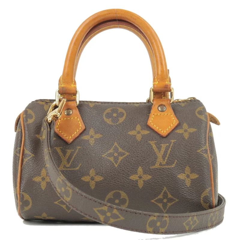 Louis Vuitton tote bags with a spacious interior and multiple pocketsLouis Vuitton Monogram Mini Speedy & Strap M41534 J75010