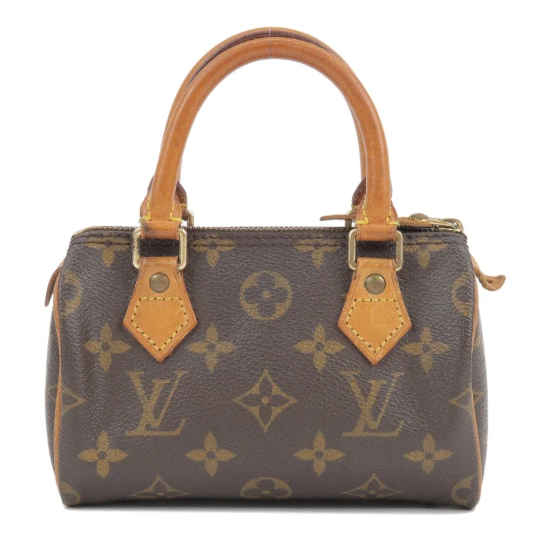 Louis Vuitton Twist bags with a crystal - embellished LV - turnlockLouis Vuitton Monogram Mini Speedy Hand Bag M41534