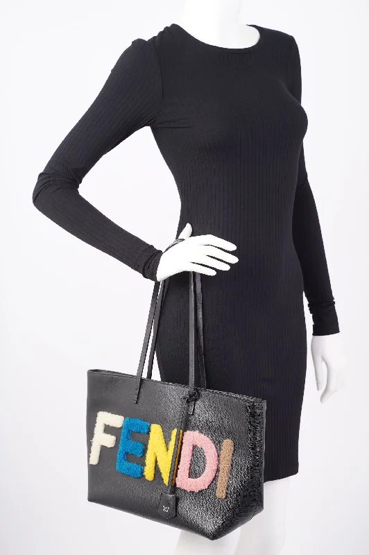 Fendi bags with a built - in USB charging port for keeping devices powered on the goFendi Logo Roll Tote Black Leather / Shearling Large