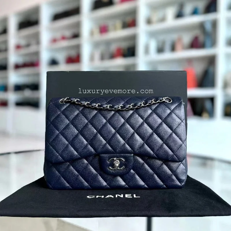 Chanel Limited Edition Handbag for CollectorsCaviar Jumbo Double Flap Classic Flap Quilted Grained Calfskin Dark Blue Silver Hardware Series 19