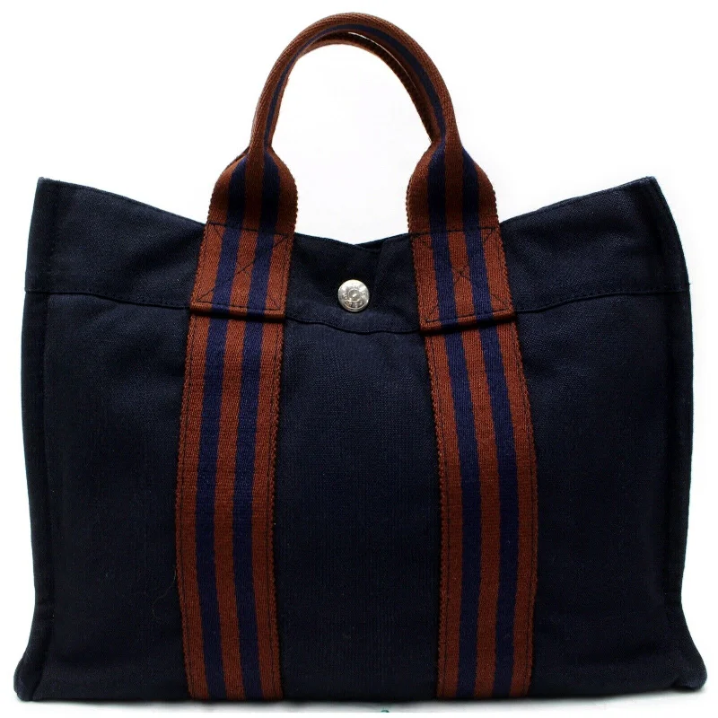 Soft - Handled Hermes So Kelly Bags for a Feminine TouchIndistinguishable  Hermes Tote Bag Sac Fool Toepm Navy Blue Canvas (SHC7-10987)