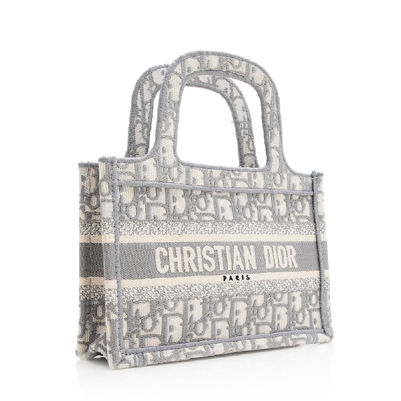 Christian Dior tote bags with a printed Dior logo on the frontDior Oblique Mini Book Tote (SHF-20891)