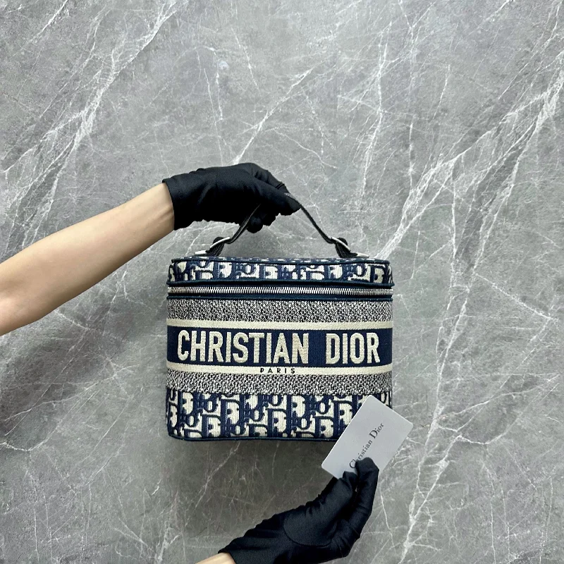 Christian Dior tote bags with a printed Dior logo on the frontTravel Vanity Case Blue Oblique Embroidery